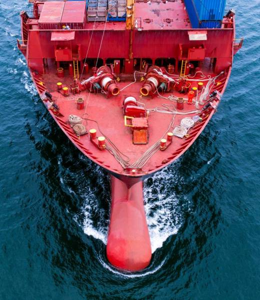 Aerial in front view of bow large cargo container ship, nose of vessel cargo ship.